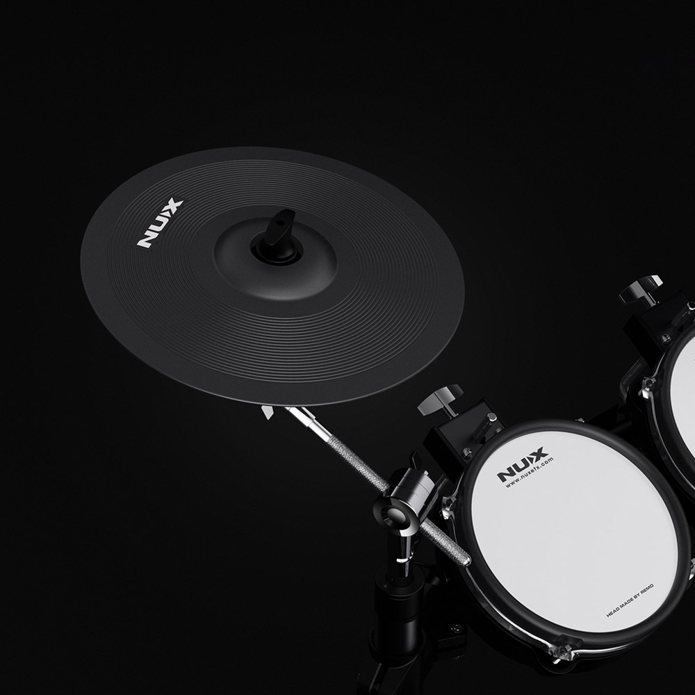 Bộ Trống Điện Chuyên Nghiệp Toàn Mặt Lưới NUX DM-7X là bộ trống điện chuyên nghiệp sử dụng toàn bộ mặt lưới REMO, mang lại độ nảy tự nhiên và khả năng chịu lực cao. Công nghệ Dual-Triggering cho snare 10" và tom 8" giúp mở rộng vùng đánh và tăng độ chính xác. Hệ thống cảm biến lực cho phép tùy chỉnh tham số từng pad để đạt độ phản hồi chân thực như trống acoustic. Mặt Lưới REMO Chất Lượng Cao DM-7X được trang bị toàn bộ mặt lưới từ REMO, mang lại cảm giác đánh thật tay và độ bền vượt trội với hơn 1 triệu cú đánh. Hai vùng trigger ở mặt và vành giúp tái hiện sắc thái âm chuẩn xác. Bộ trống mang đến trải nghiệm tự nhiên và ổn định cho mọi cú gõ. Tỏa Sáng Trên Sân Khấu DM-7X được thiết kế để nổi bật từ phòng thu đến sân khấu, với độ nhạy động học cao và khả năng tái hiện biểu cảm trống phong phú. Dù chơi rock, pop, jazz hay EDM, bộ trống mang đến âm thanh mạnh mẽ, chi tiết và kiểm soát toàn diện. Thư Viện Âm Thanh Tùy Chỉnh DM-7X sở hữu 30 bộ preset và 18 bộ kit tùy chỉnh, giúp bạn sáng tạo theo phong cách riêng. Chỉ cần xoay núm INSTRUMENT và gõ pad để chọn âm, sau đó tinh chỉnh bằng nút UP/DOWN. Bạn cũng có thể thêm hiệu ứng nhanh với ONE-KNOB EFX như Overdrive, Compressor, Reverb và Tune. Thiết Kế Khung Cong Thanh Lịch, Dễ Lắp Đặt Khung trống thiết kế kiểu dáng cong hiện đại, vừa dễ lắp đặt, vừa tối ưu không gian. Dù đặt ở phòng ngủ, phòng thu hay sân khấu, DM-7X luôn tạo nên sự nổi bật như một món đồ nghệ thuật tinh tế và chắc chắn. Ghi Âm Và Chơi Cùng Nhạc Nền DM-7X cung cấp nhiều bài demo để chơi cùng, hoặc kết nối nhạc nền qua AUX IN hay Bluetooth. Tính năng ghi âm giúp theo dõi quá trình tập luyện, phân tích kỹ thuật và cải thiện từng ngày. Lý tưởng cho luyện tập, jam cùng bạn bè hoặc thu ý tưởng nhanh. Huấn Luyện Cá Nhân Cho Người Chơi Chế độ luyện tập tích hợp gồm bốn phương pháp: Accents – luyện kiểm soát nhấn mạnh. Time Check – cải thiện độ chính xác nhịp. Quiet Count – giữ nhịp ổn định khi ngắt tiếng hỗ trợ. Change Up – thay đổi tempo & phách, rèn khả năng thích ứng. Tham Gia Cộng Đồng NUX E-Drum Người dùng DM-7X có thể tham gia cộng đồng NUX E-Drum để chia sẻ kinh nghiệm, video biểu diễn và thảo luận cùng các thành viên khác. Đây là nơi lý tưởng để học hỏi và nâng cao kỹ năng mỗi ngày. Thông Số Kỹ Thuật – 8" Tom x3, 10" Snare x1, 12" Hi-hat x1, 12" Crash x2, 14" Ride x1, Hi-hat Control x1, Kick x1, Kick Pedal x1, DM-7X Module x1 – TAP/Metronome, Rhythm, Tempo Rate, Volume, EFX – MIDI qua USB – Headphone, Output, Power In, USB MIDI, AUX IN, Tom4 Trigger-In – Toàn bộ mặt lưới Mesh Heads